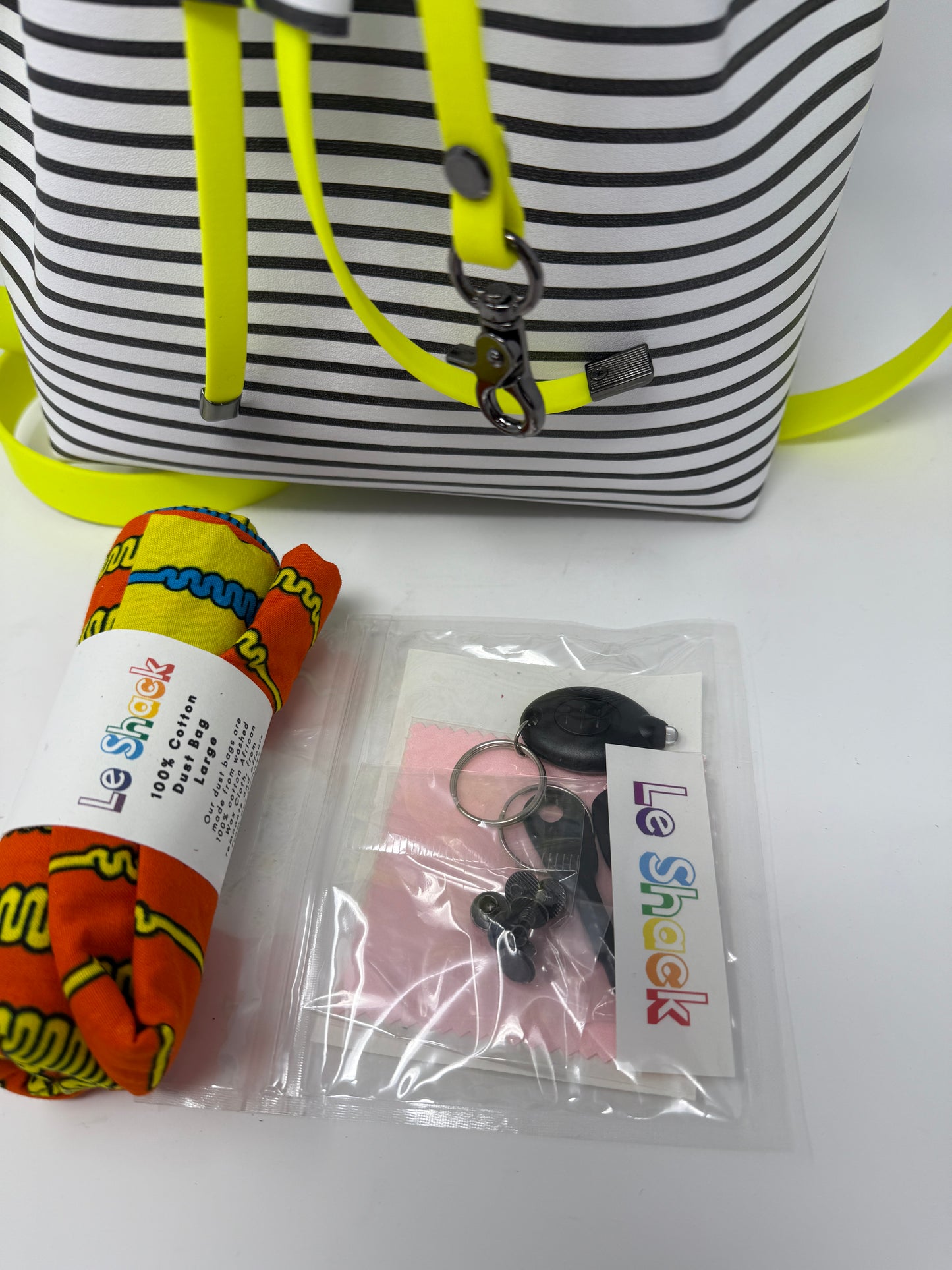 Black and White Striped Leather Drawstring Bucket Crossbody Bag